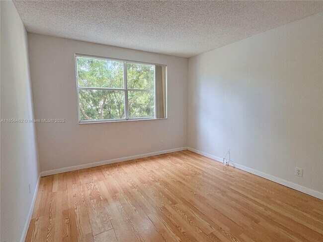 Building Photo - 9055 Wiles Rd