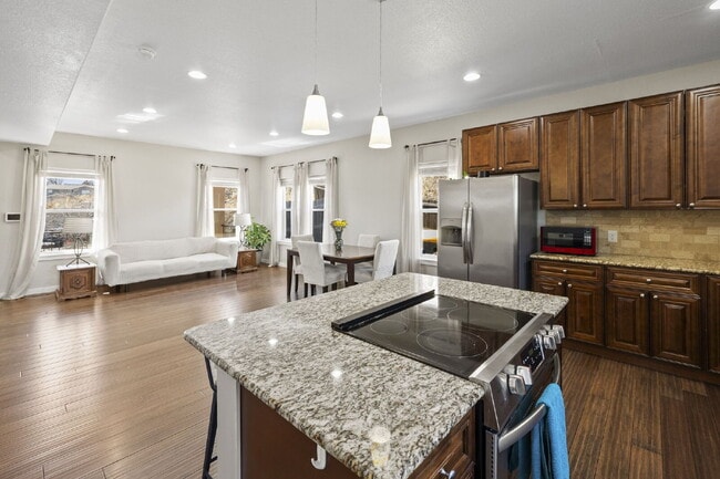 Building Photo - Spacious Home with Finished Basement, Granite Kitchen & Fenced Yard Near Fort Carson