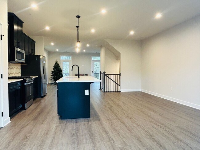 Building Photo - New Construction • 4 BR • 2 Full / 2 Half BA • End Unit Townhome in Village Town – Fayetteville’s...