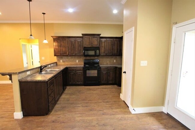 Building Photo - Available Now: 3 Bedroom, 2 Bathroom Town ...