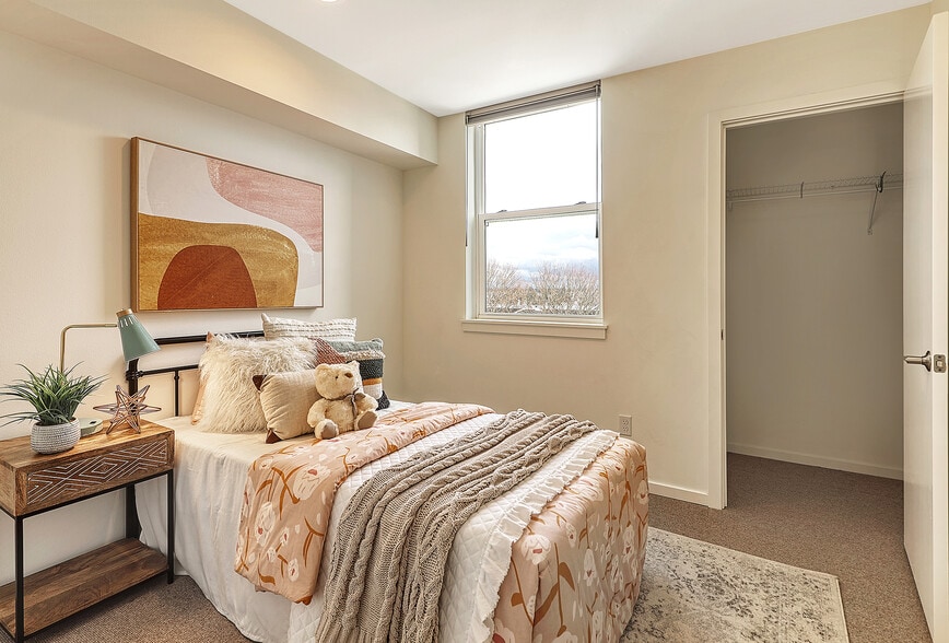 Third bedroom on the 3rd floor has a large closet under the stairs. - 818 N 47th St