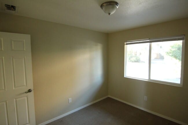 Building Photo - Beautifully Renovated 2 Bedroom 1-Bath Apartment – Private Patio • Downstairs Unit • Prime Location