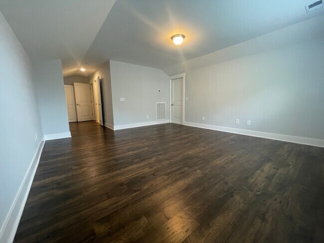15x20 Upstairs Bedroom with Walk-In Attic Access - 5100 Gracious Drive