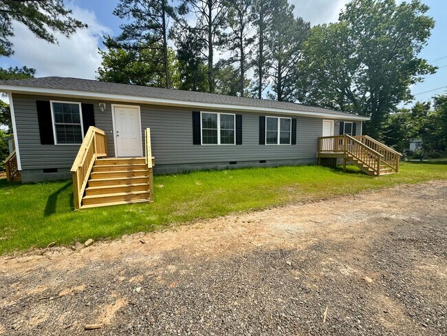 Building Photo - The Home You’ve Been Searching For! *Utilities & Furniture can be added with a rental premium.*