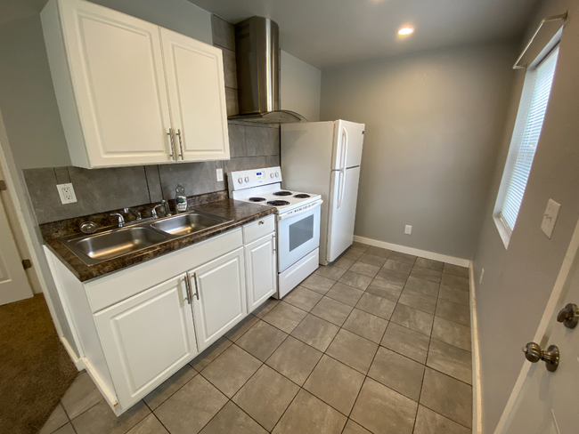 Building Photo - "Charming 1-Bedroom Rental in Wichita's De...