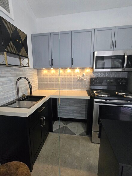 Storage cabinet above sink - 3115 54th Ave N