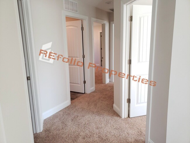 Building Photo - Charming 4 Bedroom, 2.5 Bath, 2-Car Garage...