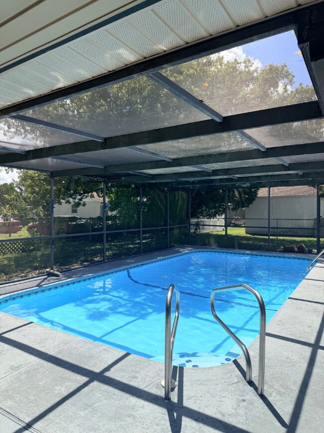Building Photo - 3 Bedroom 2 Bathroom Oversized 2 Car Garage with a Pool!