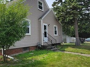 Building Photo - Beautiful Mid-Century home completely updated with two first-floor bedrooms, a spacious second-fl...