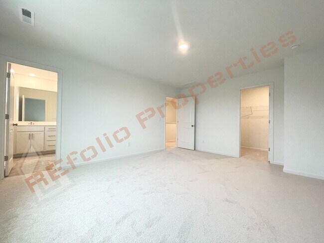 Building Photo - Brand New 3 Story, 4 bedroom, 3.5 bathroom Townhome Featuring a 1st floor Guest Suite, 2 Car Gara...