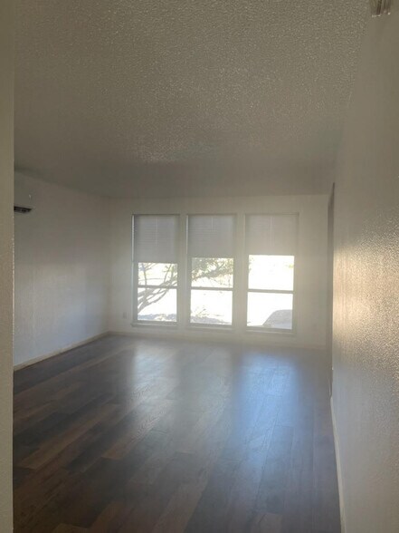 The living room offers plenty of natural light. - 240 W Kyle Dr