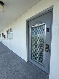 Building Photo - 8450 Sunrise Lakes Blvd