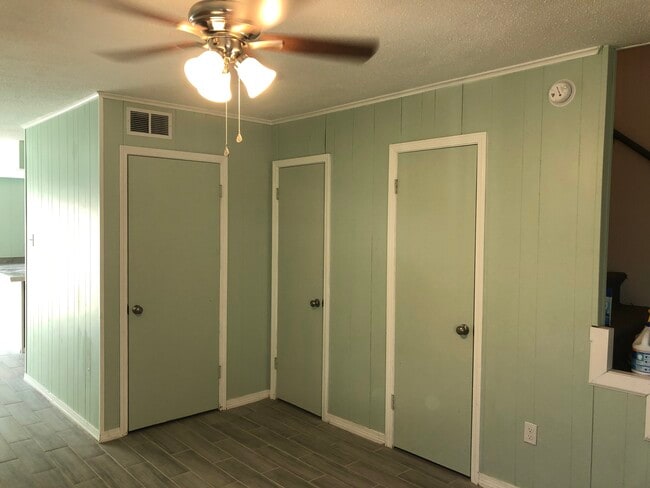 Living Room - has two closets and a half bath - 1057 Tallow Tree Ln