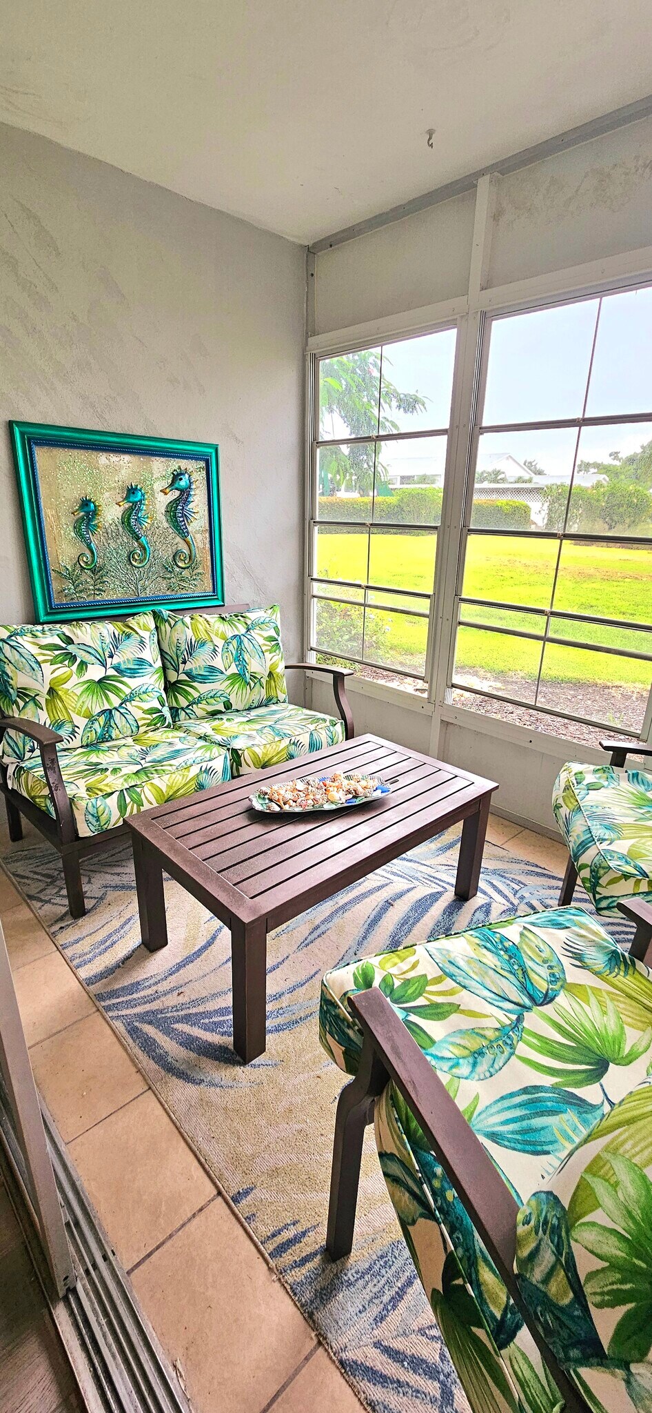 Large lanai with tiled floor - 8740 Lueck Ln