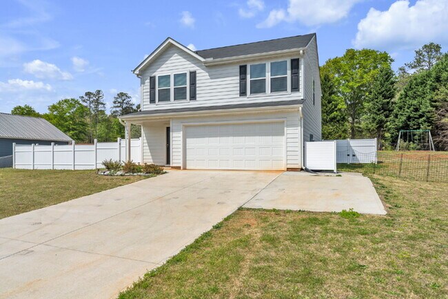 Building Photo - Stunning 3BR/2.5BA Home | Private Fenced Yard & Outdoor Oasis $2190/mo rent