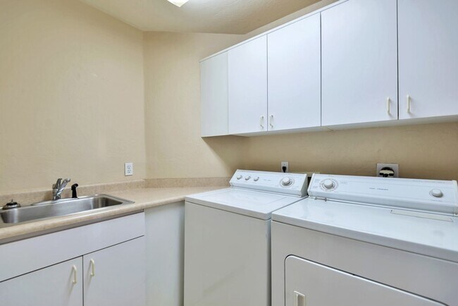 Building Photo - Experience luxury living in the prestigious Gainey Village!