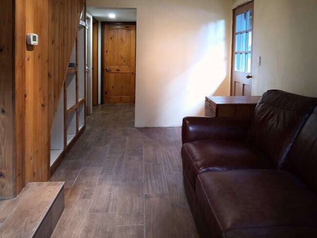 Den area with outside door. - 8008 149th St NW