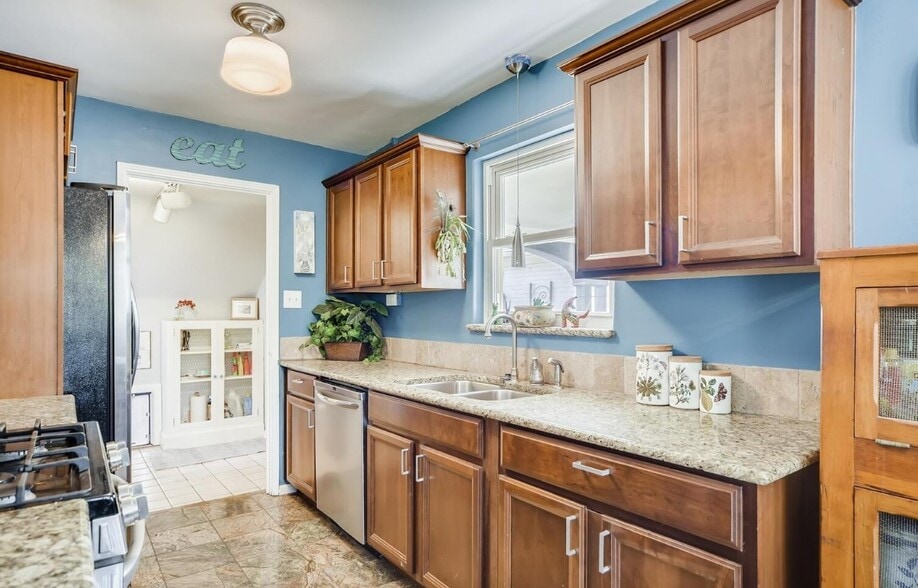 Kitchen has been updated, see additional photos. - 5701 E 28th Ave