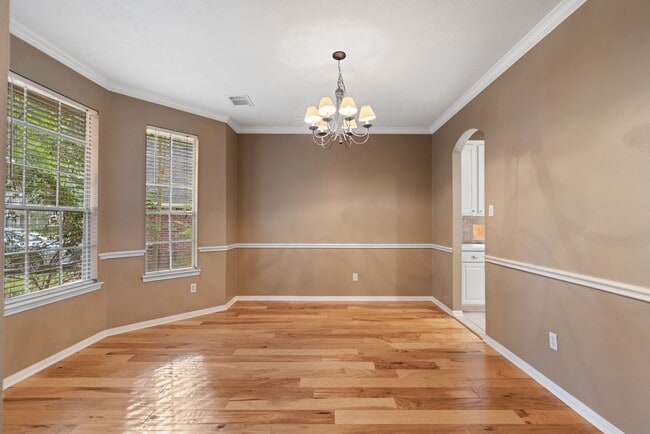 Building Photo - The Perfect Woodlands Retreat: Steps from ...