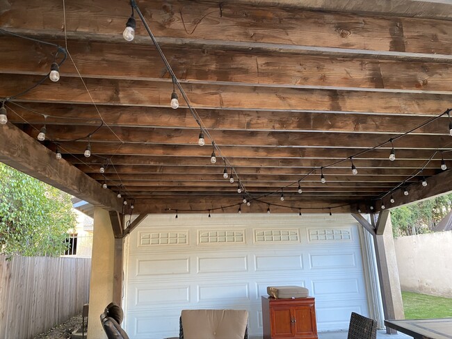 Outside sitting area lighting with different colors. - 10725 Westminster Ave