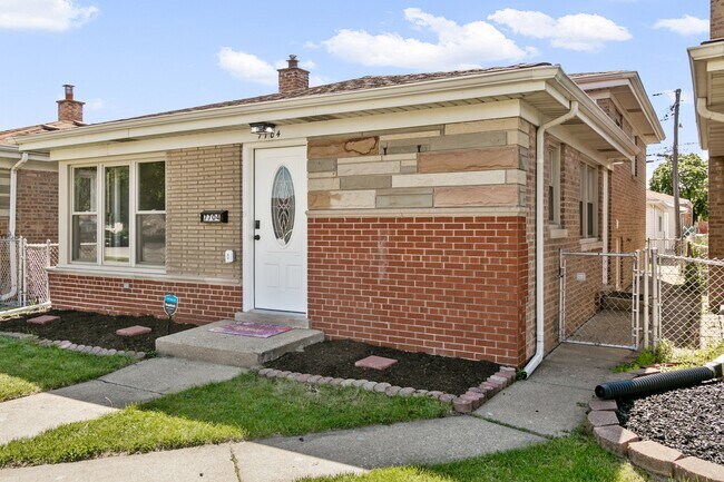 Building Photo - 7704 McVicker Ave