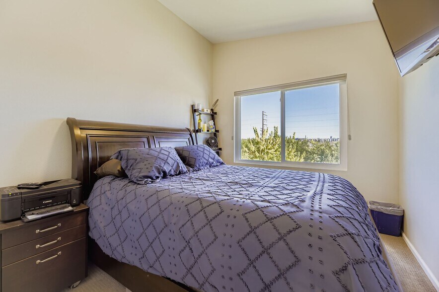 Bedroom 2 w/energy efficient windows & Denver skyline city views to the distant northeast - 1197 S Mariposa St