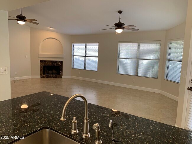 Building Photo - 8889 E Aster Dr