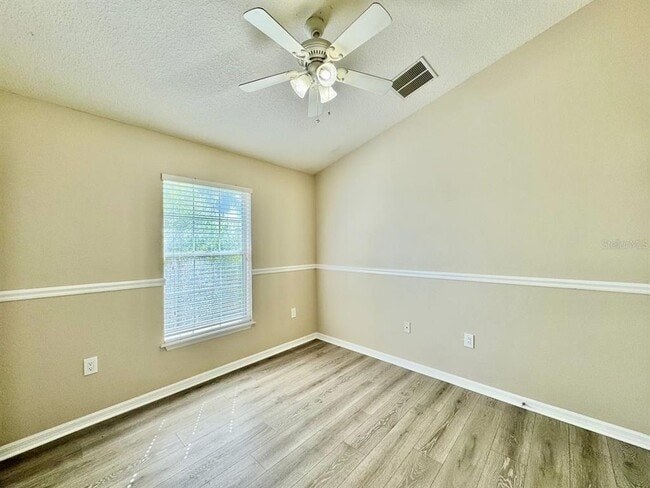 Building Photo - 6713 Breezy Palm Dr