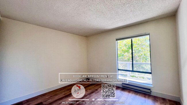Building Photo - Beautiful sunny top floor condo, includes ...