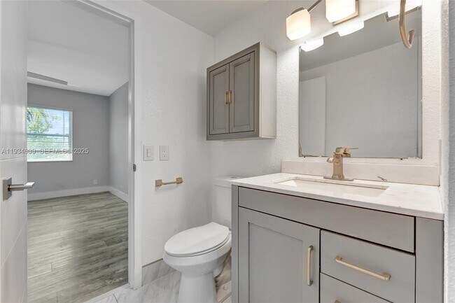 Building Photo - 1400 NE 57th Ct