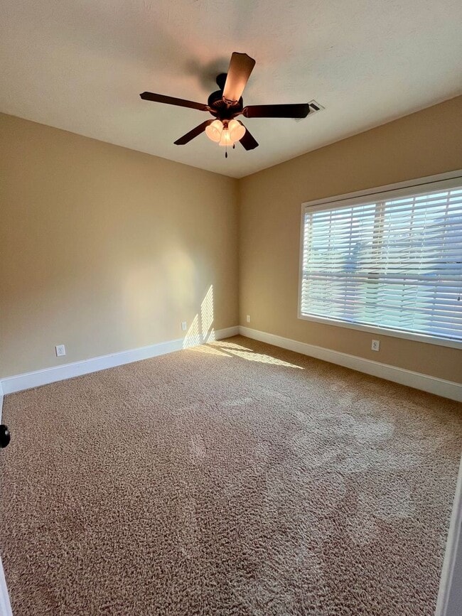 Building Photo - Spacious 3-Bedroom Home with Garage, Large...