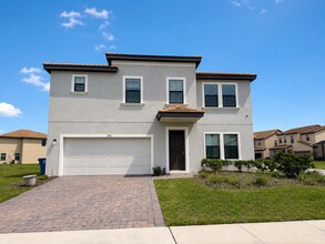 Building Photo - Spacious 5-Bedroom with 4.5 Baths at 176 Mitchell's Manor, Haines City!