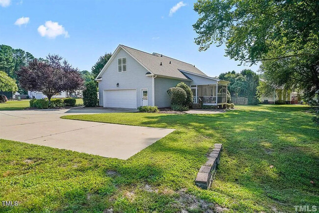 Building Photo - Captivating 1.5-Story Haven with No HOA & ...