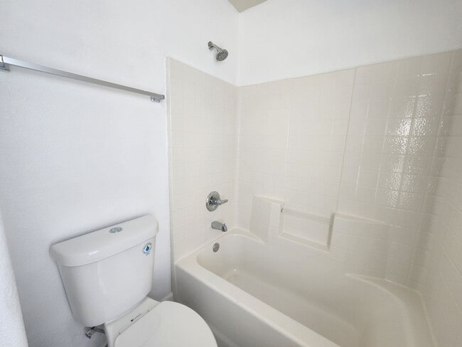 Building Photo - Sleek 2 story home with tile in most living areas and upgraded kitchen.