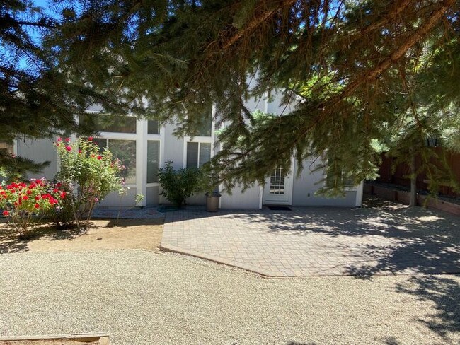 Building Photo - Coming Up Roses - NW Reno 4 Bedroom/3 Car Garage Single Story House