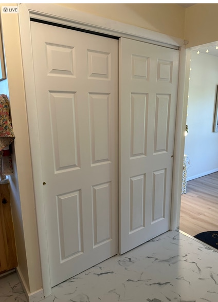 Sliding doors to cover laundry area - 91 Faith St