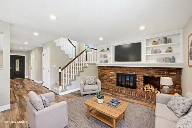 Building Photo - Spacious 4BR Home with Finished Basement, Private Yard & Community Amenities