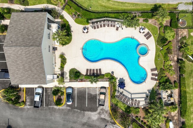 Building Photo - WATERFRONT LIVING! BEAUTIFULLY APPOINTED CONDO ON THE BAYOU IN OS SCHOOL DIST - FULLY FURNISHED