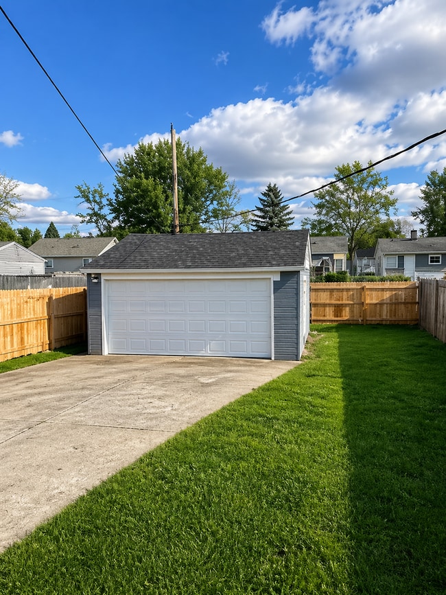 Building Photo - Updated 2BR Home with Finished Basement and 2-Car Garage