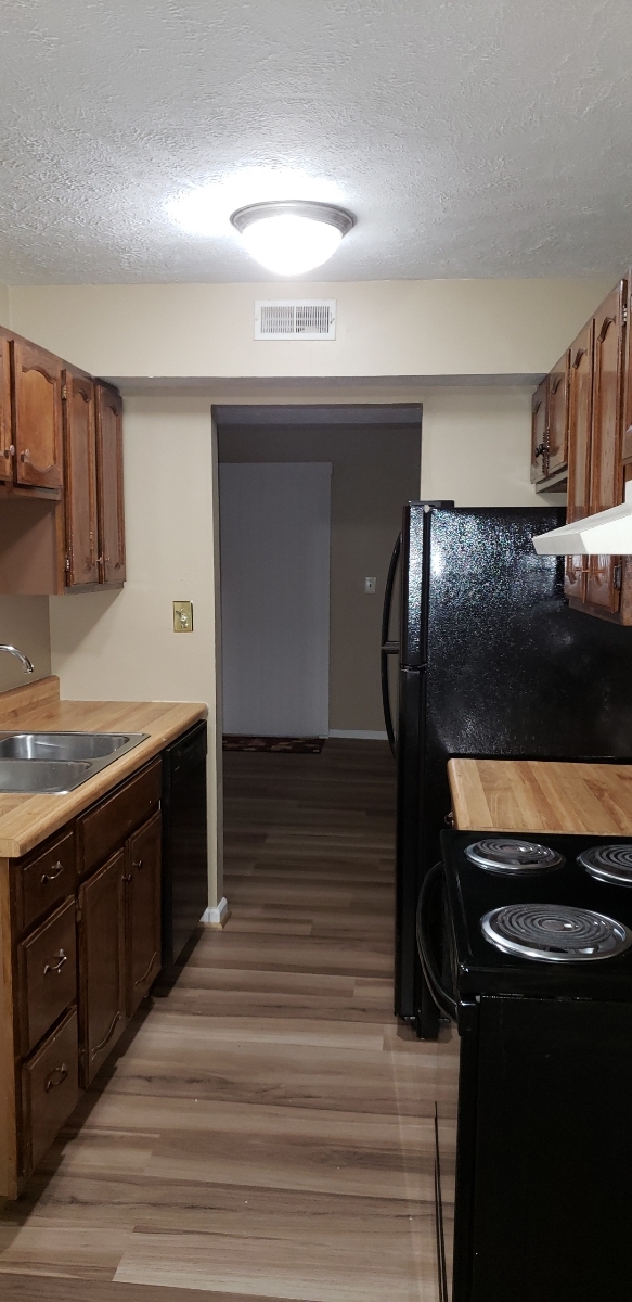 Kitchen shows new floors - 3 Oneonta Dr