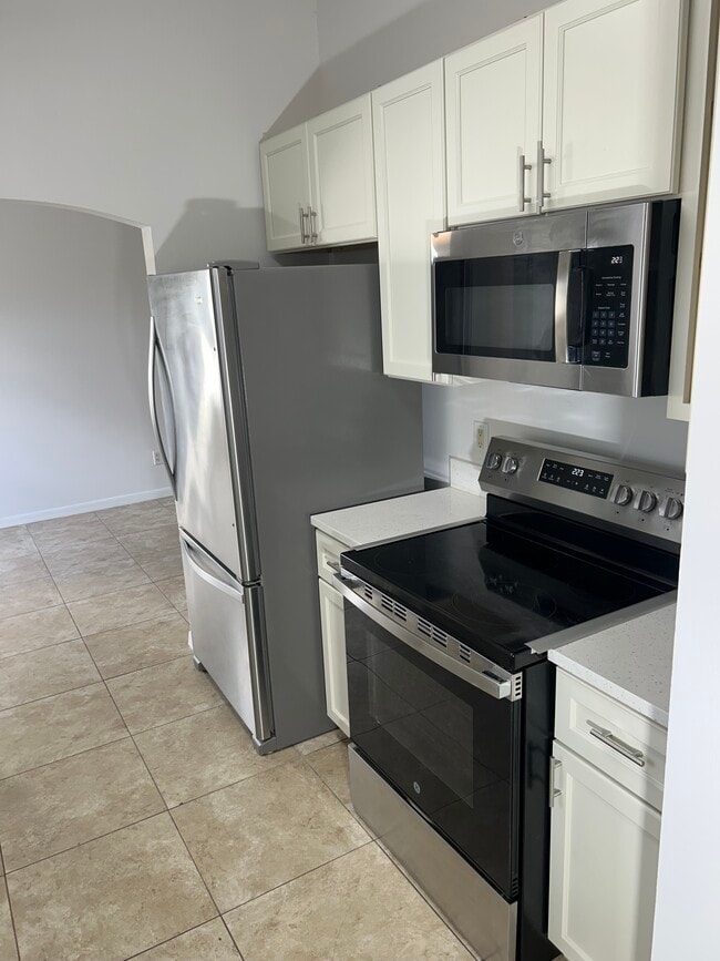 Building Photo - 6480 NW Volucia Dr