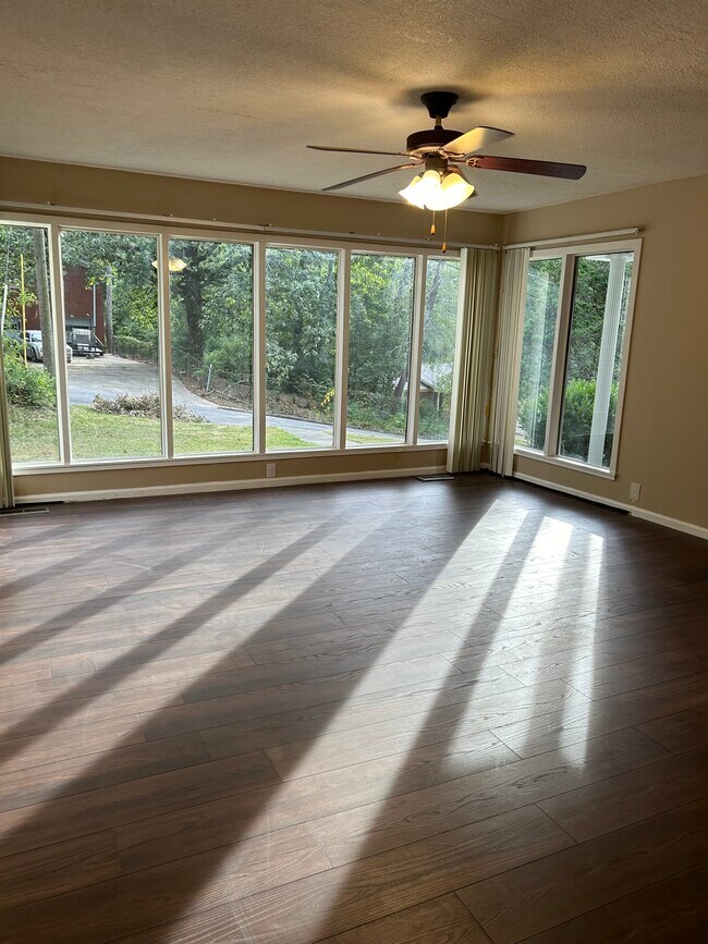 Large Living Room with an abundance of natural light. - 2613 6th St NW
