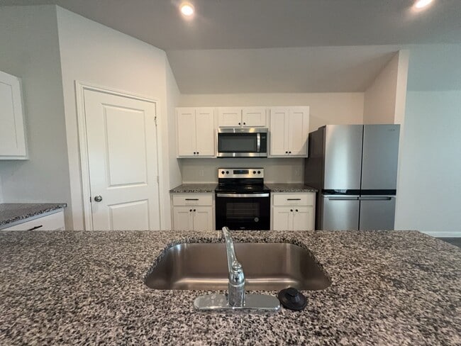 Building Photo - Move-in special $150 off first month rent. | A modern 4-bed, 2-bath home
