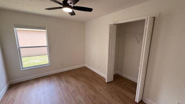 Building Photo - "Stunning 4-Bedroom Lake View Home in Oviedo – Spacious 2,132 Sq Ft Retreat!"