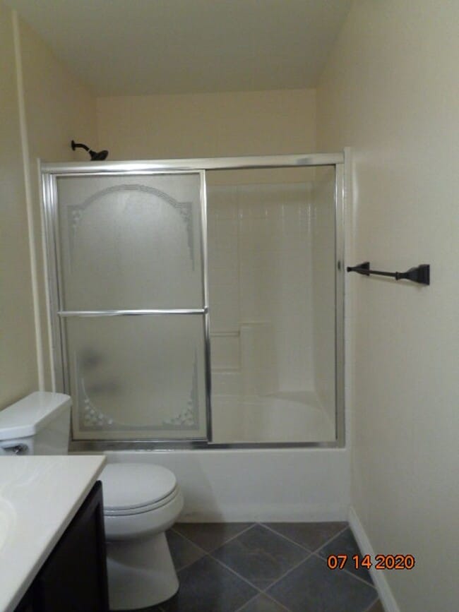Building Photo - Stunning 2 BR/2 BA Lower Level Condo w/ 1 ...