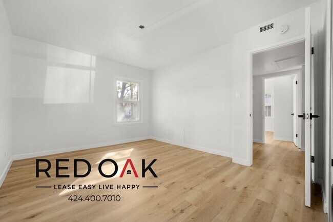 Building Photo - 8752 Belford Ave