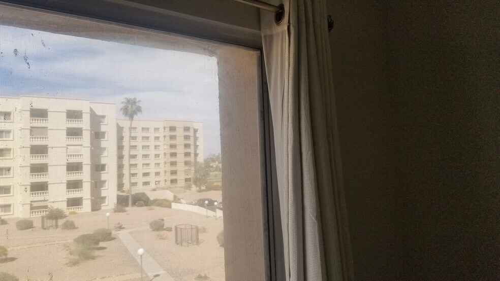 Building Photo - 7910 E Camelback Rd