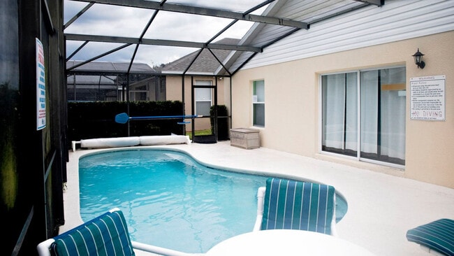 Building Photo - 8159 Fan Palm Way