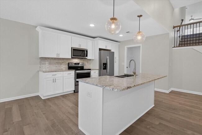 Building Photo - Like New Three Bedroom with Bonus!