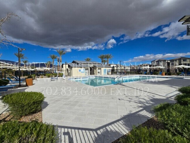 Building Photo - Gated~ 2 Bedroom Townhome w/2 Car Garage~MUST SEE!